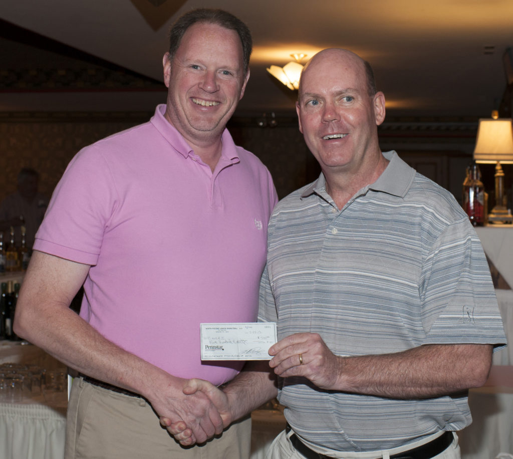 The North Pocono Junior Basketball League recently made a contribution of $500 to support the Northeast Regional Cancer Institute. Pictured at the check presentation are Jerry Coles (left), Board Member, North Pocono Junior Basketball League and Bob Durkin (right), President, Northeast Regional Cancer Institute.